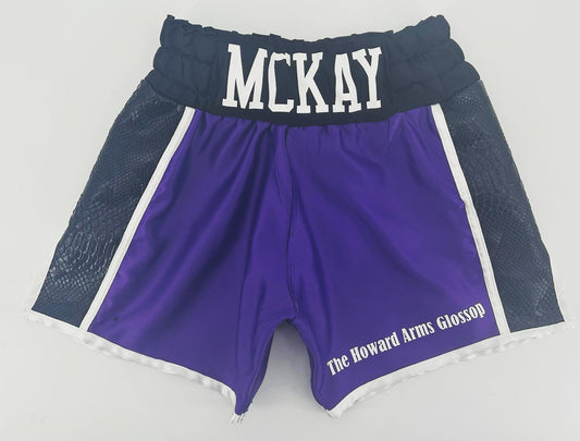 Purple boxings shorts, black snakeskin sides