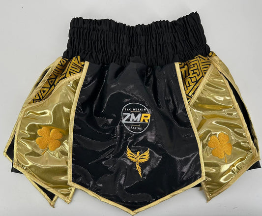 Black and gold Tribal print gladiator shorts